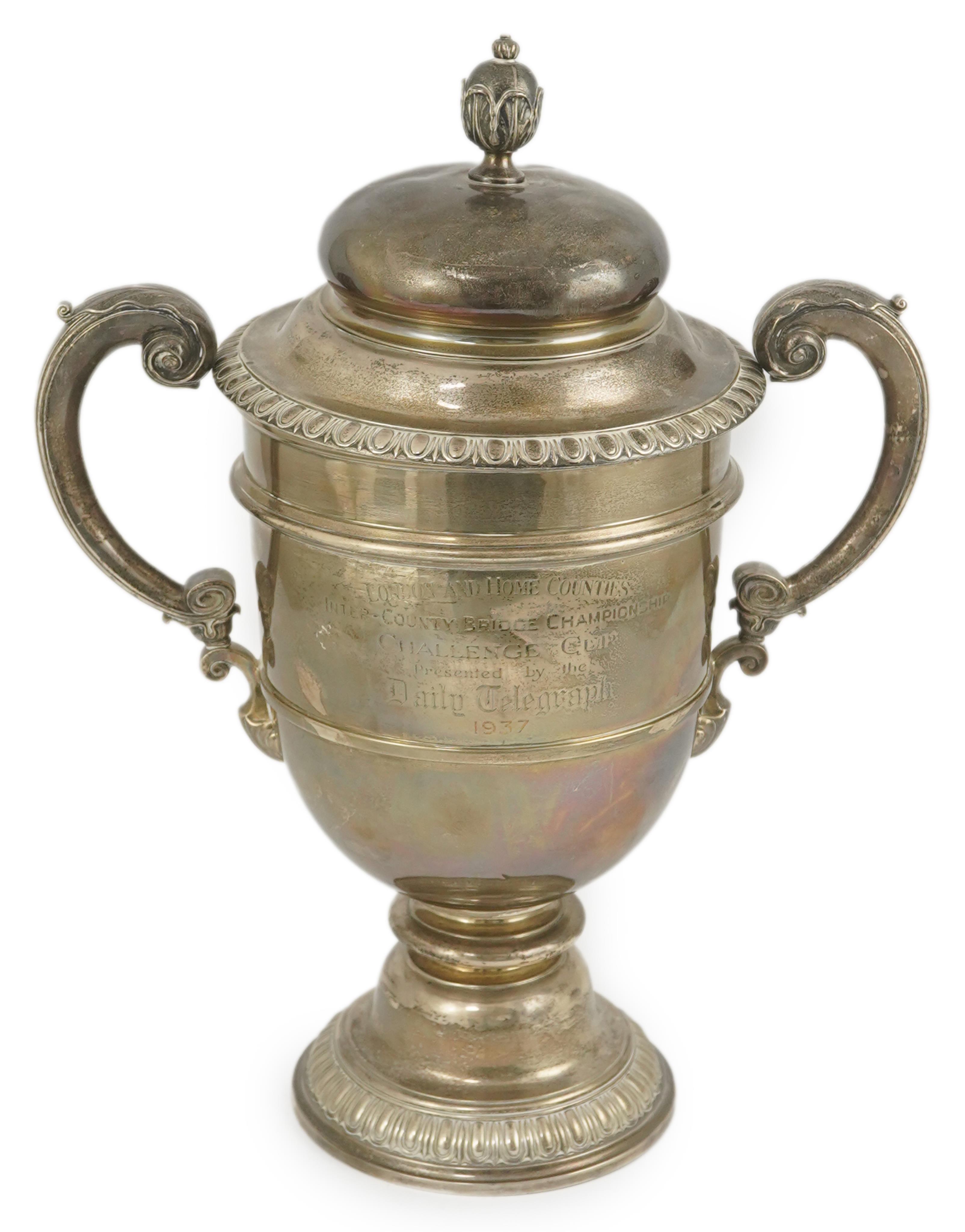 A George V silver two handled presentation trophy cup and cover by Hunt & Roskell Ltd (late Storr & Mortimer)